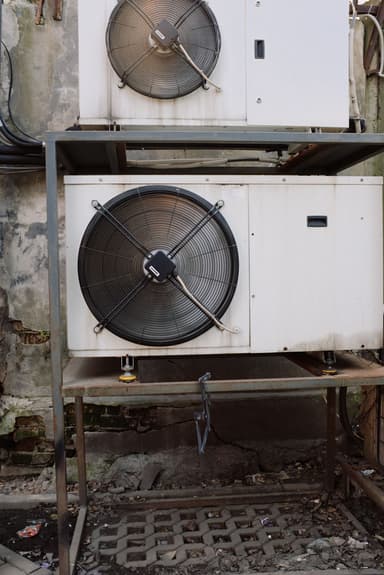 Industrial air conditioning units with large fans mounted outdoors