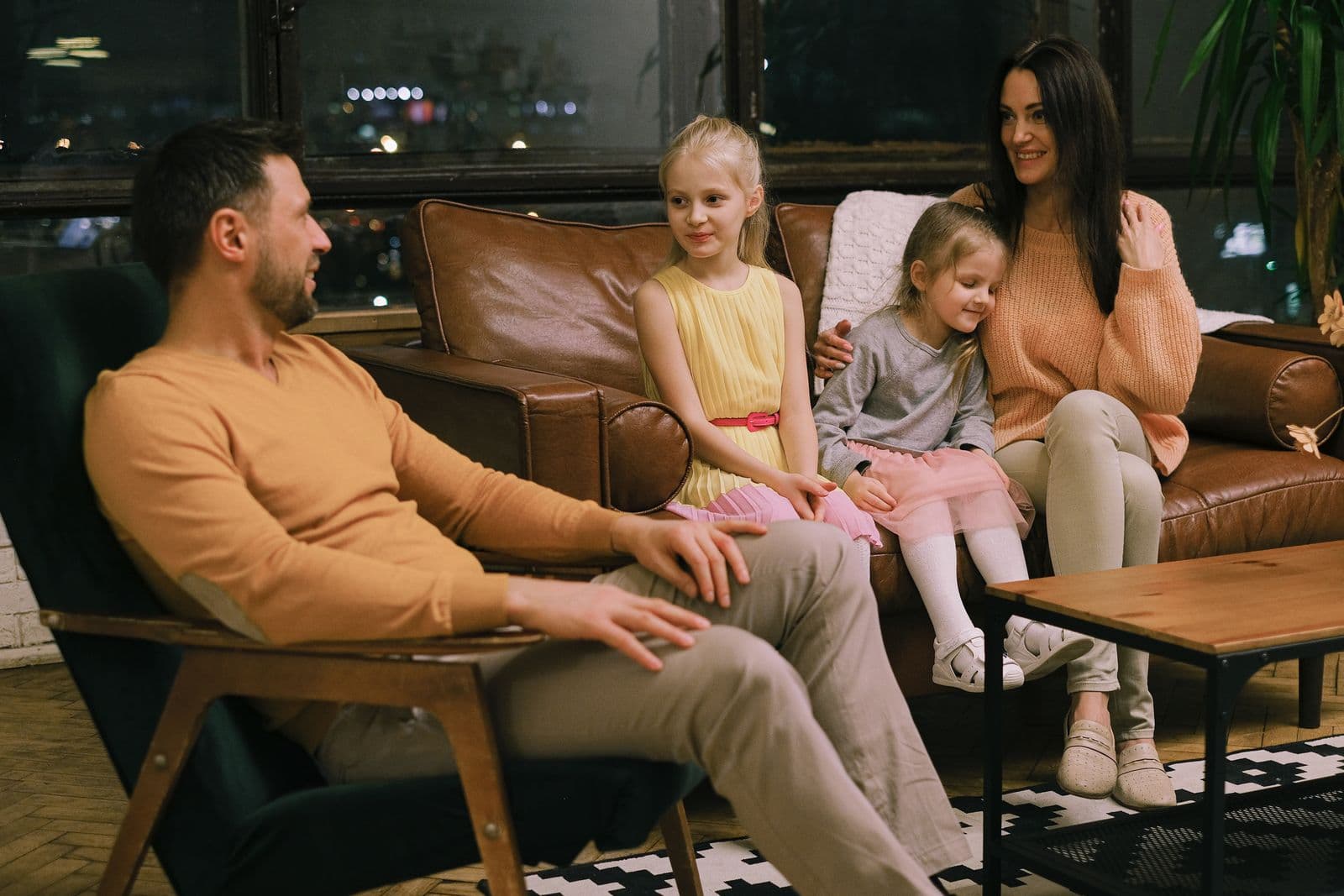 Family relaxing together in a comfortable living room