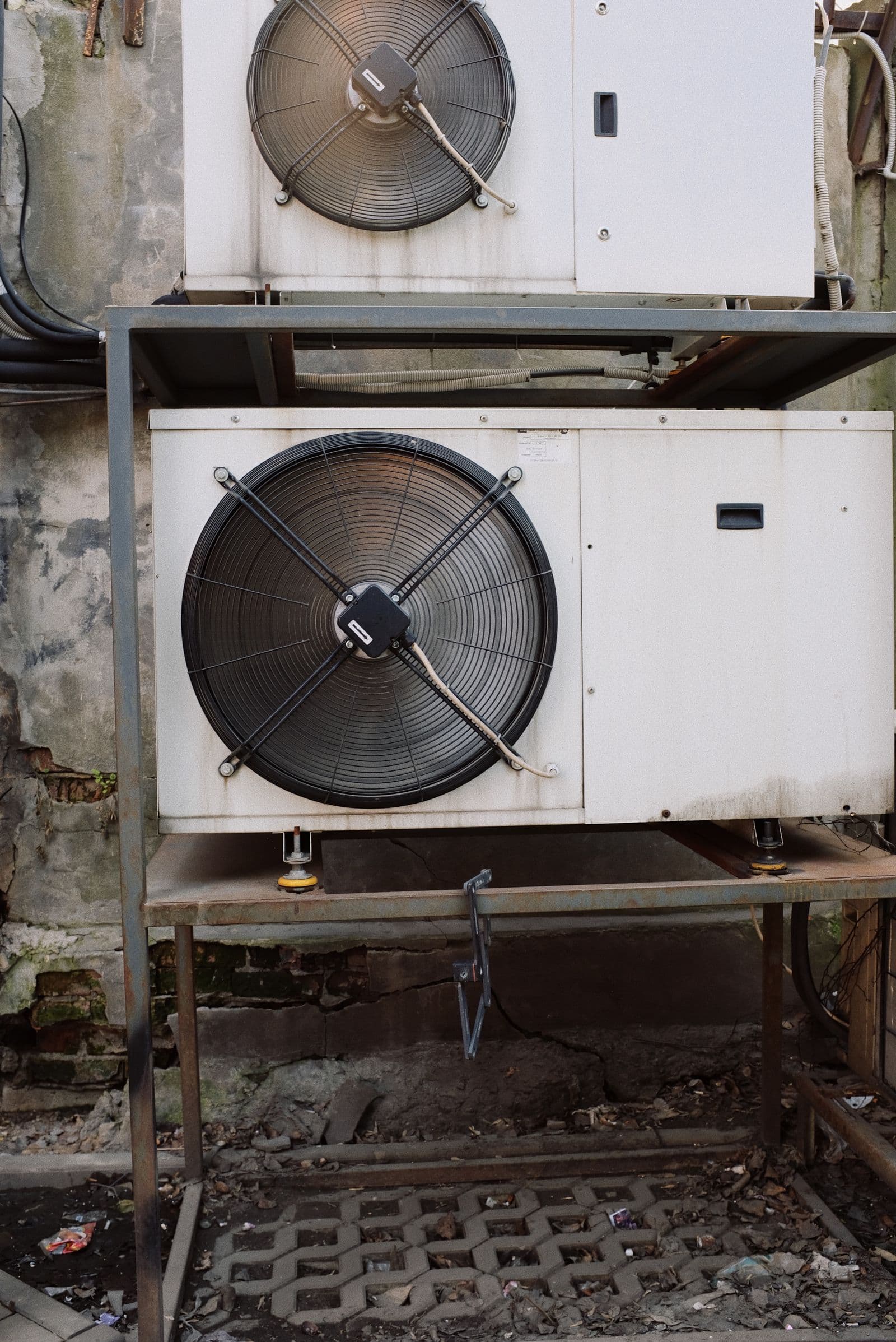 Industrial air conditioning units with large fans mounted outdoors
